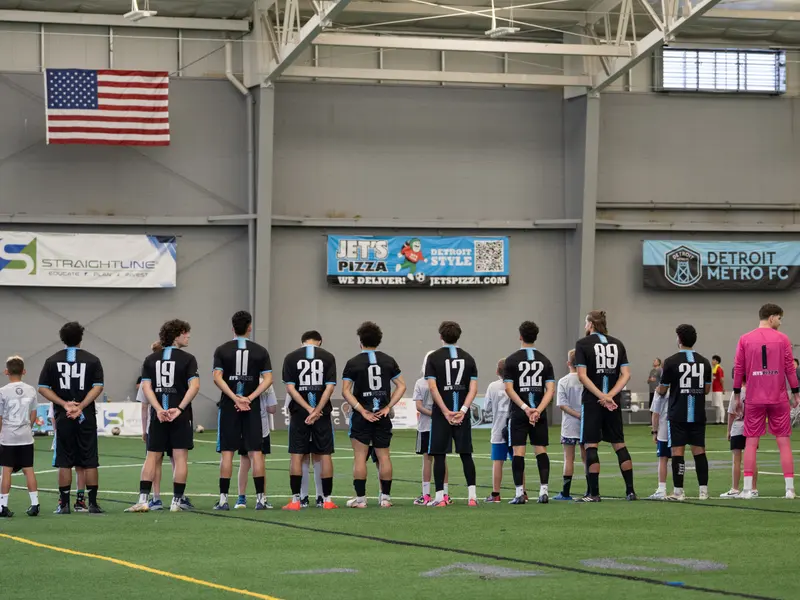Detroit Metro FC lines up for the anthem at Legacy Center