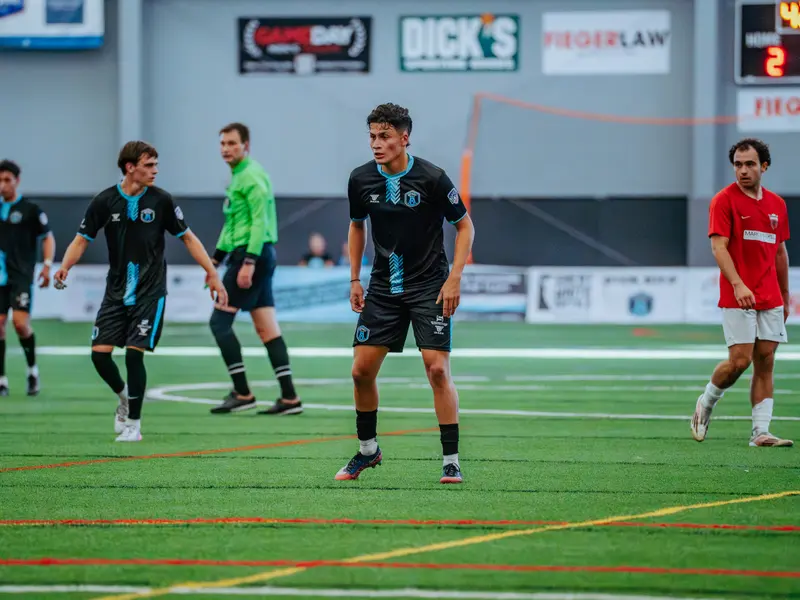 Detroit Metro FC players on the pitch during a match